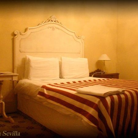 Hostal-Casa Sol Y Luna Siviglia Camera foto